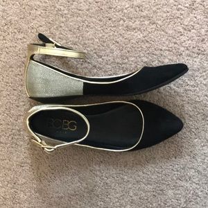 Black and gold flats